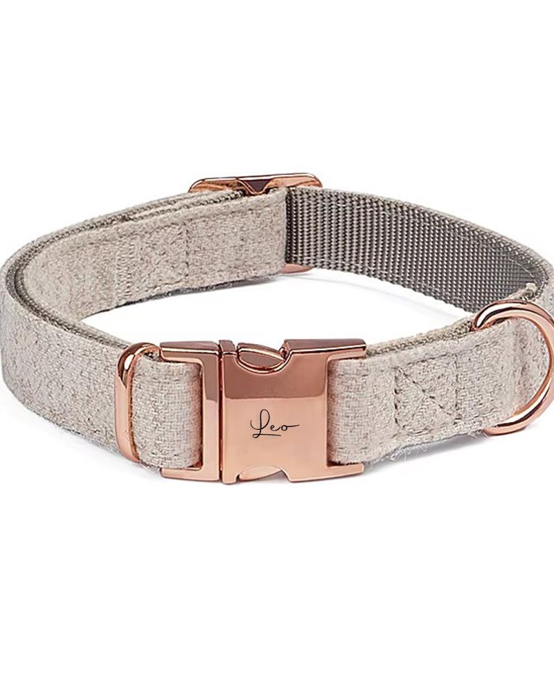 Dog collar with rose gold hardware on a white background