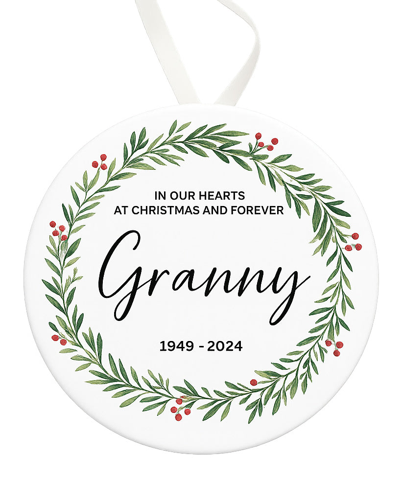 Memorial ornament with wreath design and text 'In our hearts at Christmas and forever, Granny 1949-2024' on a white background.