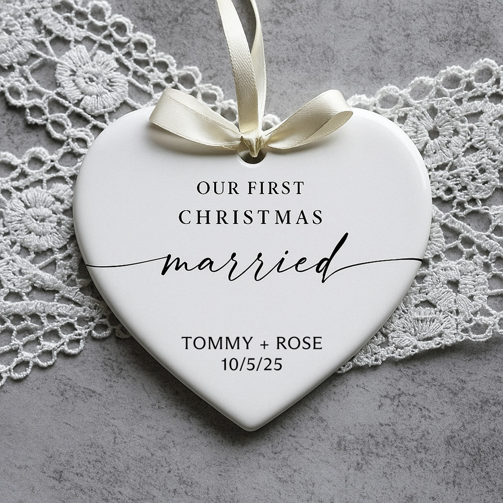 Heart-shaped ornament with 'Our First Christmas Married' text on a lace background