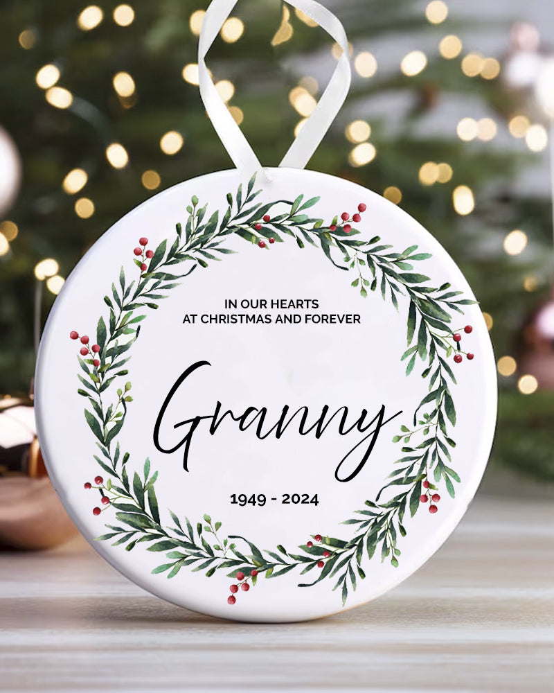 Memorial ornament with 'Granny' and years text, surrounded by a green leaf wreath on a white background.