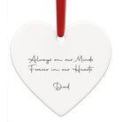 Heart-shaped white ornament with black text and a red ribbon on a white background
