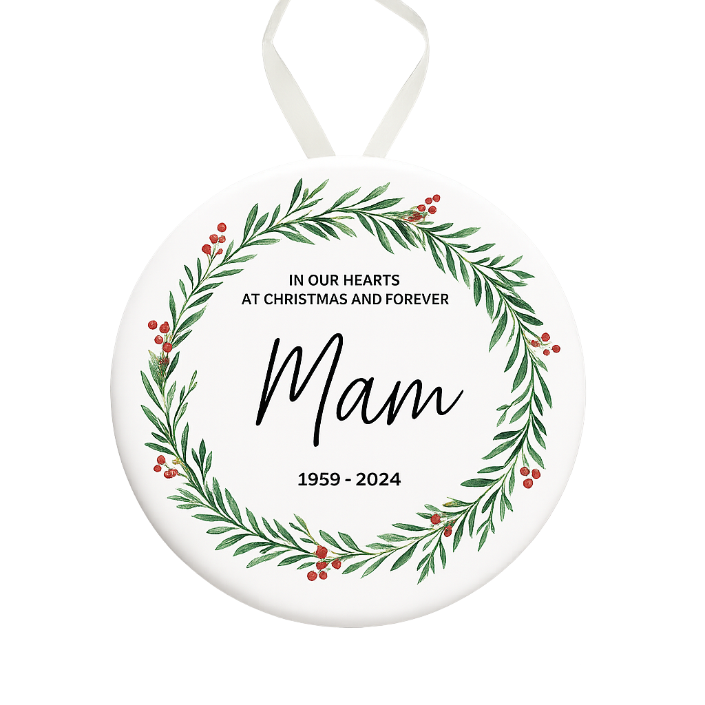 Memorial ornament with wreath design and text 'In our hearts at Christmas and forever Mam 1959-2024' on a white background.