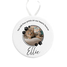 Round ceramic ornament with a photo of a cat named Ellie and text on a white background