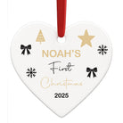 Heart-shaped ornament with 'Noah's First Christmas 2025' text and decorative elements on a white background.